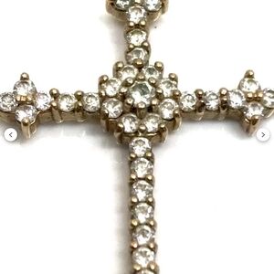 Elegant Gold and Silver Cross Pendant